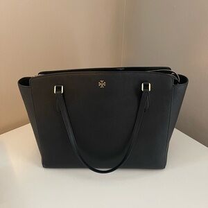Black Tory Burch tote with laptop sleeve
